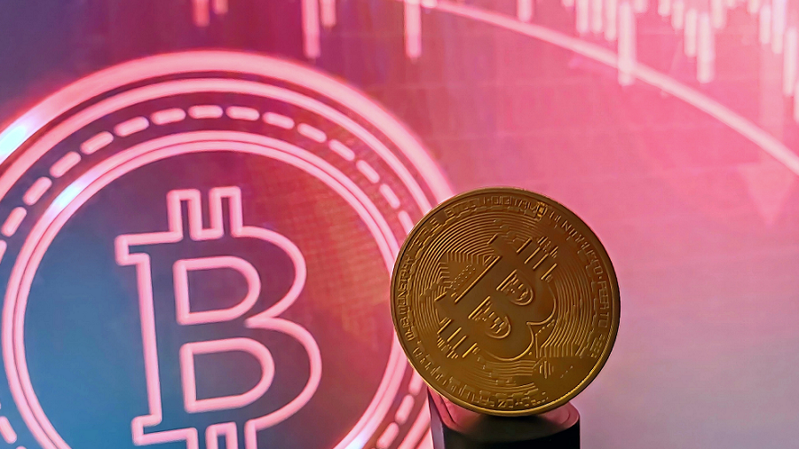 Bitcoin Drops Below $77,000 as Oil Surges Past $100